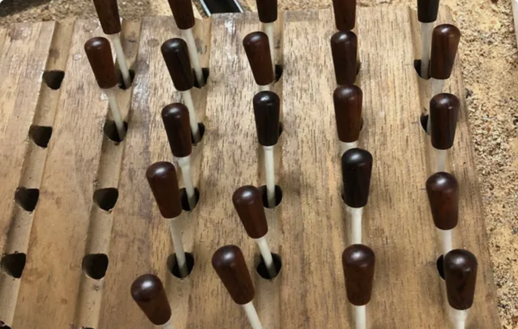 Puzzle game with wooden pegs